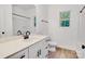 This bathroom has white cabinets and modern matte black fixtures at 117 Lippard St, Statesville, NC 28677