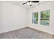 This bedroom has two windows and soft carpet at 117 Lippard St, Statesville, NC 28677