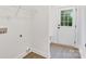 A clean laundry room with bright natural light at 117 Lippard St, Statesville, NC 28677