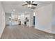 Bright, open floor plan with hardwood floors, white walls, and modern finishes at 117 Lippard St, Statesville, NC 28677