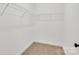 Empty walk-in closet featuring metal shelving ready for organizational touches at 117 Lippard St, Statesville, NC 28677