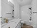 Bright bathroom featuring quartz counters, modern fixtures, and combined tub and shower at 1300 Austin Chaney Rd, Wingate, NC 28174