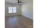 Spacious bedroom with a ceiling fan, and a large window that provides natural light at 1300 Austin Chaney Rd, Wingate, NC 28174