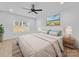 Bedroom with ceiling fan, hardwood floors, and sunny window at 1300 Austin Chaney Rd, Wingate, NC 28174