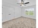 Cozy bedroom with a ceiling fan, plush carpeting and natural light at 1300 Austin Chaney Rd, Wingate, NC 28174