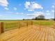 This outdoor deck features a wooden deck overlooking a backyard at 1300 Austin Chaney Rd, Wingate, NC 28174