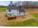 Aerial view of the home's back, with a deck and partial yard at 1300 Austin Chaney Rd, Wingate, NC 28174