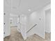 Bright hallway with neutral carpet, white walls and natural lighting at 1300 Austin Chaney Rd, Wingate, NC 28174