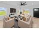 Bright, modern living room with white walls, hard wood flooring, and lots of windows at 1300 Austin Chaney Rd, Wingate, NC 28174