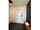 Modern walk-in shower featuring sleek marble tile at 1300 Austin Chaney Rd, Wingate, NC 28174