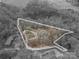 Aerial view of a large property surrounded by mature trees, outlining the lot lines at 1816 Country Garden Dr, Shelby, NC 28150