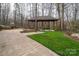 Inviting backyard with a covered gazebo, perfect for relaxation and outdoor gatherings at 1816 Country Garden Dr, Shelby, NC 28150