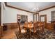 Inviting dining room featuring a wood table, a chandelier, and a rug at 1816 Country Garden Dr, Shelby, NC 28150