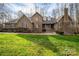 Spacious two-story brick home featuring a manicured lawn and beautiful landscaping at 1816 Country Garden Dr, Shelby, NC 28150