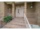 Welcoming brick front porch with steps and decorative hanging plants at 1816 Country Garden Dr, Shelby, NC 28150