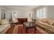 Bright living room featuring hardwood floors, elegant furniture, and ample natural light at 1816 Country Garden Dr, Shelby, NC 28150