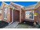 Welcoming brick entrance with a detailed walkway, garden, and beautiful windows at 1911 Connemara Ct, Gastonia, NC 28054