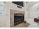 Cozy fireplace with tile surround, offering a warm ambiance to the living space at 1911 Connemara Ct, Gastonia, NC 28054