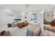 Spacious living room with cozy seating arrangement, a wood coffee table, and an open floor plan at 1911 Connemara Ct, Gastonia, NC 28054