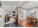 Open living area featuring a fireplace, dining room, and view to another living space at 1911 Connemara Ct, Gastonia, NC 28054