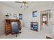Comfortable office space with ample storage and natural light from a nearby hallway at 1911 Connemara Ct, Gastonia, NC 28054