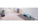 Spacious, carpeted basement with workout equipment, perfect for a home gym at 19113 Hawk Haven Ln, Charlotte, NC 28278