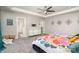 Bright primary bedroom with trey ceiling and ensuite bath access, offering comfort and privacy at 19113 Hawk Haven Ln, Charlotte, NC 28278