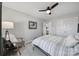 Inviting bedroom with neutral walls, a ceiling fan, and a comfortable reading nook at 2167 Whispering Winds Dr, Rock Hill, SC 29732