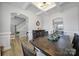 Beautiful dining room featuring a coffered ceiling, light walls and trim, and a hardwood floor at 2167 Whispering Winds Dr, Rock Hill, SC 29732