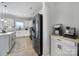 Well-equipped kitchen featuring stainless steel appliances, white cabinets, and an adjacent coffee bar for added convenience at 2167 Whispering Winds Dr, Rock Hill, SC 29732