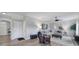 Spacious living room featuring hardwood floors, neutral paint, and cozy furnishings for relaxing and entertaining at 2167 Whispering Winds Dr, Rock Hill, SC 29732