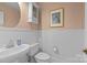 Charming powder room with classic fixtures and white wainscoting at 2606 Chesterfield Ave, Charlotte, NC 28205
