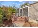 Outdoor deck with stairs leading to the backyard, ideal for relaxing and entertaining at 2606 Chesterfield Ave, Charlotte, NC 28205