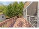 Outdoor deck area with lush greenery, offering a secluded and peaceful retreat at 2606 Chesterfield Ave, Charlotte, NC 28205