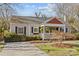 Charming single-Gathering home with a cozy front porch and well-maintained landscaping at 2606 Chesterfield Ave, Charlotte, NC 28205