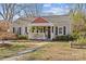 Charming single-Gathering home with a cozy front porch and well-maintained landscaping at 2606 Chesterfield Ave, Charlotte, NC 28205