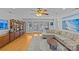 Bright living room with access to an outdoor deck and hardwood floors at 2606 Chesterfield Ave, Charlotte, NC 28205