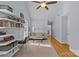 Bright living room features hardwood floors, vaulted ceiling, and built-in desk with shelving at 2606 Chesterfield Ave, Charlotte, NC 28205