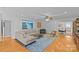 Spacious living room features hardwood floors, a sectional sofa, and an open floor plan at 2606 Chesterfield Ave, Charlotte, NC 28205