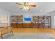 Spacious living room with hardwood floors and built in shelving and cabinets at 2606 Chesterfield Ave, Charlotte, NC 28205