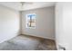 A cozy bedroom featuring neutral walls and carpet at 3030 Crawford Ave, Gastonia, NC 28052