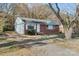 Charming single-story brick home featuring a well-maintained front yard and a classic design at 3030 Crawford Ave, Gastonia, NC 28052