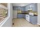 A cozy kitchen featuring blue cabinets and modern appliances at 3030 Crawford Ave, Gastonia, NC 28052