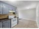 A cozy kitchen featuring blue cabinets and modern appliances at 3030 Crawford Ave, Gastonia, NC 28052