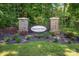 Stone pillars with a 'Stagecoach Station' sign surrounded by greenery, indicating the neighborhood entrance at 3262 Maple Ridge Dr, Gastonia, NC 28052