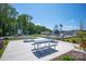 A recreational space with picnic tables adjacent to a community playground, perfect for Gathering outings at 3262 Maple Ridge Dr, Gastonia, NC 28052