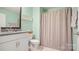 Charming bathroom with granite vanity, a decorative mirror, and a shower with a curtain at 3878 Fairlady Ln, Fort Mill, SC 29707