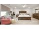 Bright bedroom with wooden furniture and a large king-size bed at 3878 Fairlady Ln, Fort Mill, SC 29707