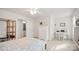 Well-lit bedroom with a desk, chair, and a view of the en-suite bathroom at 3878 Fairlady Ln, Fort Mill, SC 29707