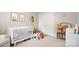 Adorable Bedroom with a white crib, playful decor, and ample space for a growing Gathering at 3878 Fairlady Ln, Fort Mill, SC 29707